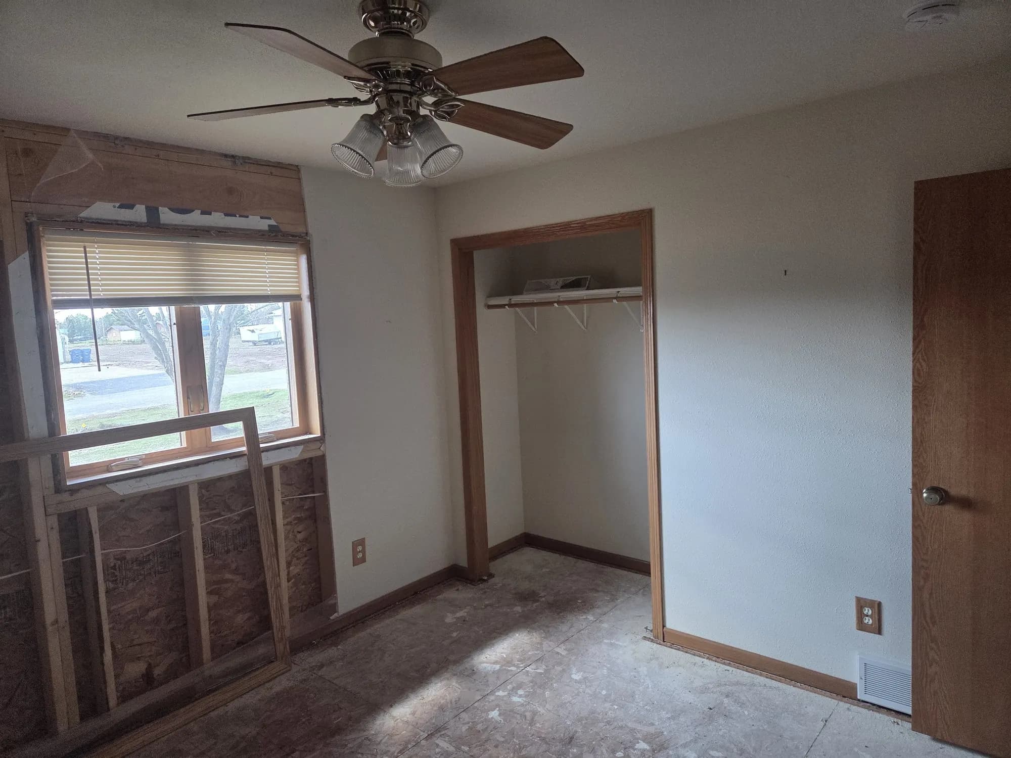Demolished closet and framing during water-damage mitigation.
